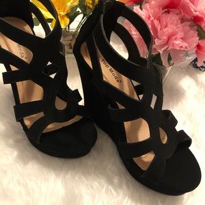 Women’s black wedges sandals.